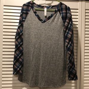 Sweater with plaid sleeves
